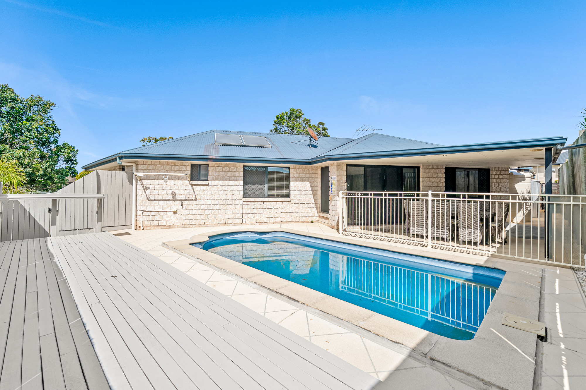 Rear view of 25 Keith Street, Kuraby showing the in-ground pool