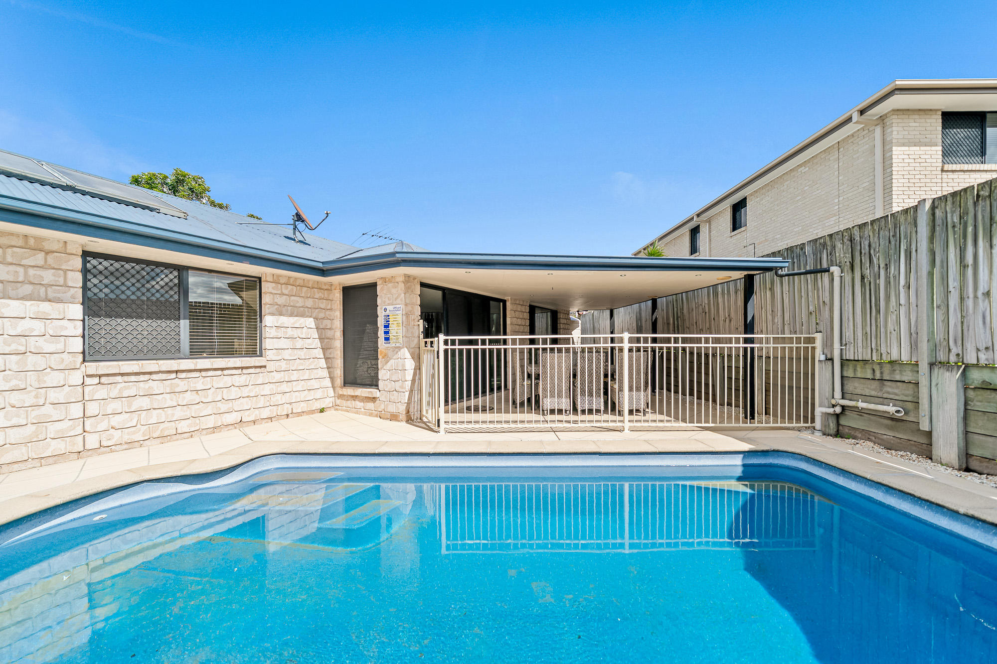 Pool area with safety fencing at 25 Keith Street, Kuraby