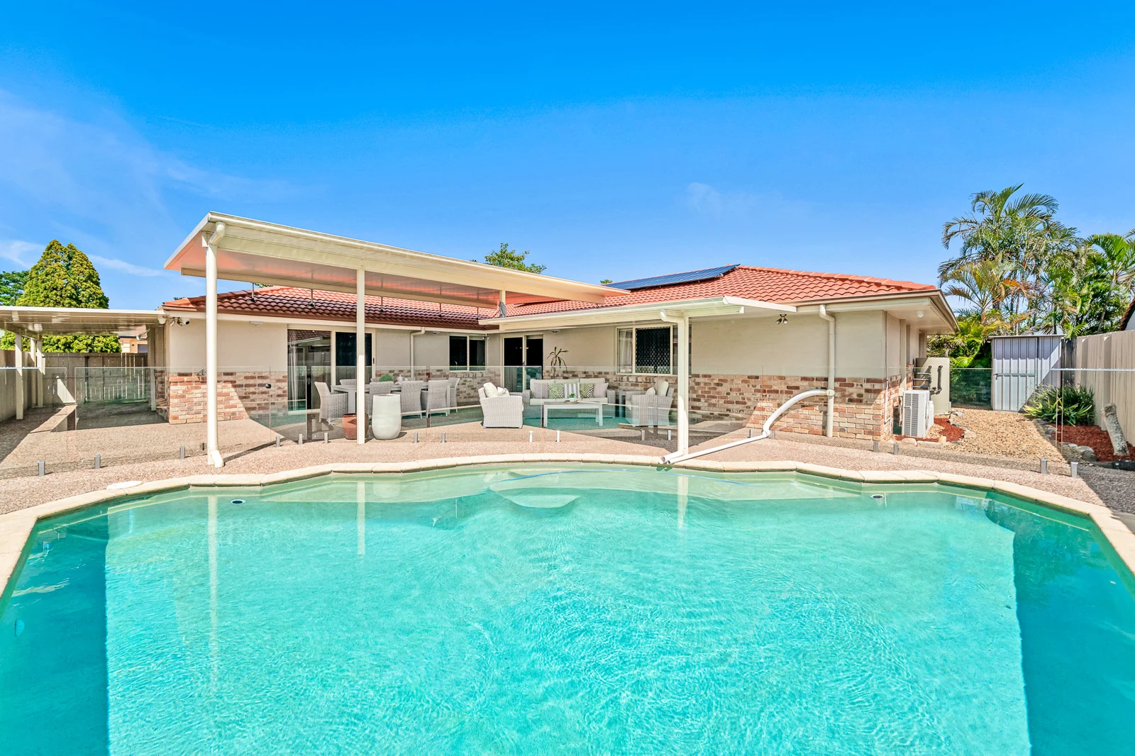 In-ground pool at 27 Greenhaven Crescent, Kuraby