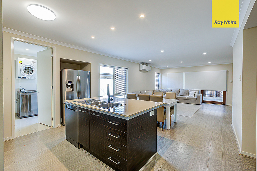 Open-plan kitchen, dining and living area at 29 Slate Court