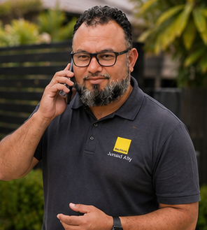 Junaid Ally on a phone call with a client