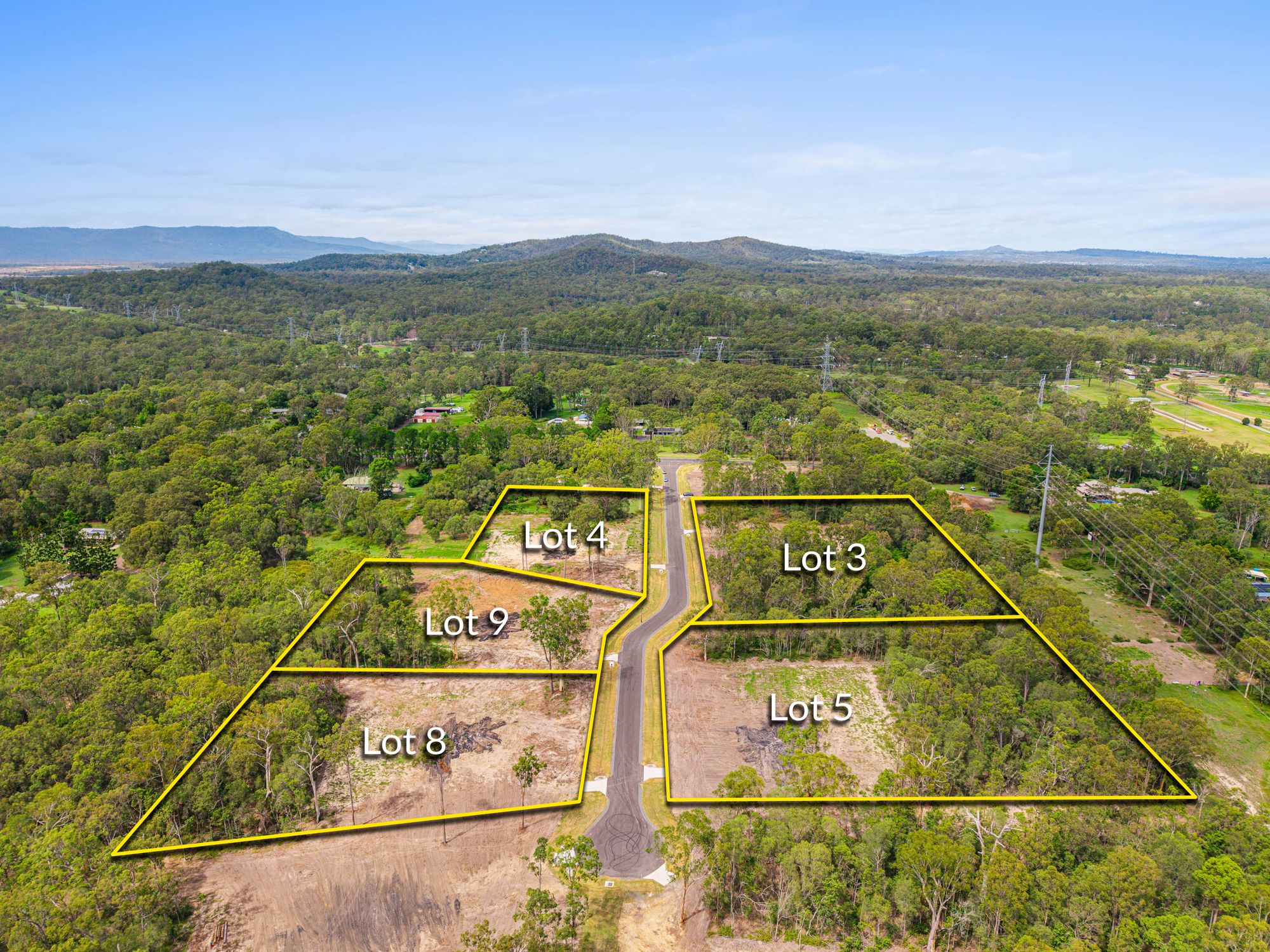 Fahim Place estate with all lots outlined, mountain backdrop